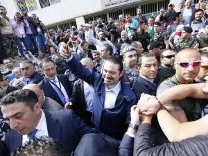 Saad Hariri takes a selfie after leaving a polling station in past poll (AFP/File Photo)	