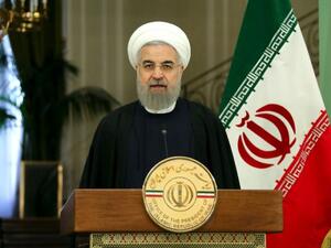 Iran's President Hassan Rouhani has slammed some arab countries for zero react against Israeli violence in Gaza. (AFP Photo/Atta Kenare)