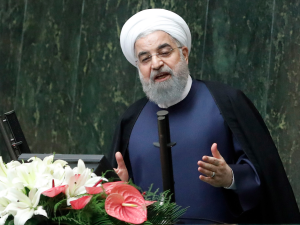 Iranian President Hassan Rouhani (C) delivers a speach to the parliament in Tehran on August 20, 2017, as Iran's parliament prepares to vote on the president's cabinet.