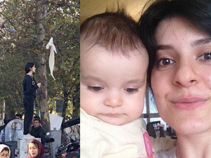 Pictures of Iranian activist Vida Movahed, who defied compulsory hijab, with her toddler have been widely shared on Twitter (Twitter)