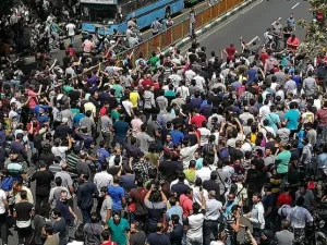 Iranian protesters shout slogans during a demonstration in central Tehran on June 25, 2018. (AFP)