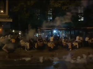 Gay pride supporters are fired upon with tear gas by Turkish forces. (Twitter/@b9AcE)