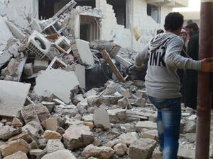 Archival image shows rubble from bombed-out buildings in the city of Raqqa, November 2014 (AFP)