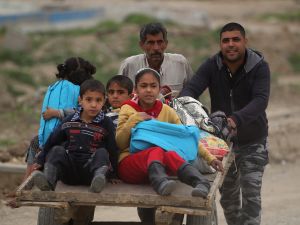 “I’m very happy,” said 8-year old Sara Umar. “It’s better to go to school in the morning instead of staying at home.” (AFP) 