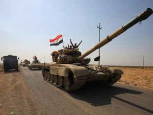 Iraqi forces drive towards Kurdish peshmerga positions on October 15, 2017, on the southern outskirts of Kirkuk (Ahmad Al-Rubaye/AFP)
