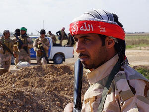 A Hashd al-Shaabi fighter in 2015 (Wikimedia Commons)