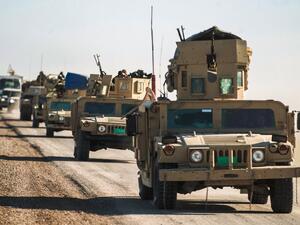 Iraqi tanks and armoured vehicles advance towards the village of Sheikh Younis, after the offensive to retake the western side of Mosul commenced on February 19, 2017. (AFP/Ahmad Al-Rubaye)