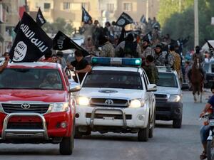 Daesh members driving through the streets of Mosul. (AFP/File)