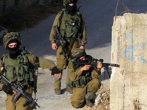 Israeli soldiers raid West Bank city of Nablus and injures a Palestinian. (AFP/ File Photo)