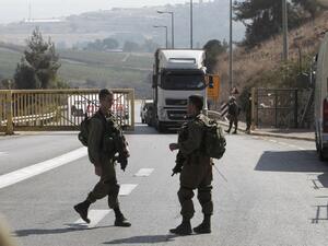 Israeli security forces are seen in the town of Metula, near the Lebanon-Israel border, on October 26, 2016, after gunfire from a vehicle in Lebanon towards Israeli forces wounded an Israeli soldier. (AFP/Jalaa Marey)