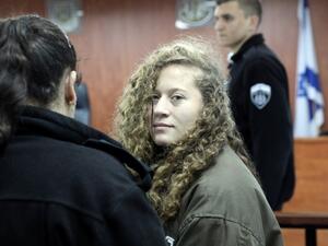 Ahed Tamimi is accused of throwing stones - a charge that carries a 10-year prison sentence. (AFP/ File Photo)