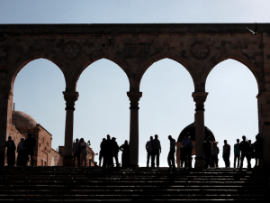 Palestinians are blocked on one side of the the flashpoint Al-Aqsa mosque compound, also known as the Temple Mount complex in Jerusalem's Old City during the visit of a controversial Jewish parliament member on August 29, 2017.