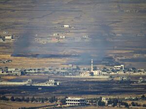 A picture taken from the Israeli-occupied Golan Heights shows smoke billowing from the Syrian side of the border on June 24, 2017, after projectiles fired from the war-torn country hit the Golan. (Jalaa Marey/AFP)