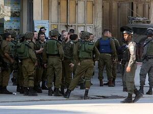Israeli occupation army forces have detained more than 12 Palestinians including two sisters across the  West Bank. (AFP/ File)