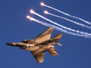 Israeli warplane has attacked a group of Palestinians trying to launch incendiary kites and balloons near border. (AFP/ File)