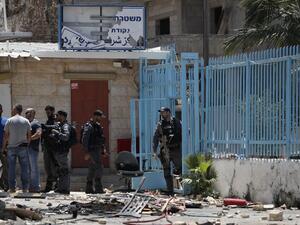 Israeli security forces are seen in the Arab city of Kfar Qassem in central Israel after a man was killed during clashes as protesters attempted to storm a police station overnight on June 6, 2017. (AHMAD GHARABLI / AFP)