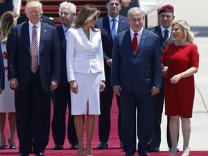 US President Donald Trump (L), First Lady Melania Trump, Israeli Prime Minister Benjamin Netanyahu (C) and his wife Sara are seen upon Trump's arrival at Ben Gurion International Airport in Tel Aviv on May 22, 2017, as part of his first trip overseas. (AFP/Jack Guez)