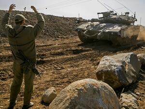 An Israeli tank near the border with Syria (AFP/File Photo)	