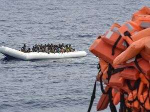 his file photo taken on November 05, 2016 shows migrants and refugees on a rubber boat waiting to be evacuated during a rescue operation by the crew of the Topaz Responder, a rescue ship run by Maltese NGO "Moas" and the Red Cross, on November 5, 2016 off the coast of Libya. (AFP/Andreas Solaro)