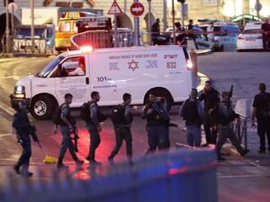 Israeli security forces and an ambulance are seen at the scene of an attack outside Damascus Gate in Jerusalem's Old City on June 16, 2017. (Thomas Coex/AFP)