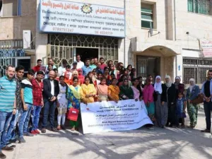 Stakeholders pose for a group photo at the project launch ceremony at the General Trade Union of Workers in Textile, Garment and Clothing Industries. (Jordan Times) 