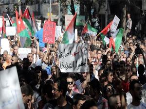 Activists have called for another hour-long blackout on Monday, and for placing the Jordanian flag on buildings.  (AFP/Ahmad Alameen) Activists have called for another hour-long blackout on Monday, and for placing the Jordanian flag on buildings.  (AFP/Ahmad Alameen)