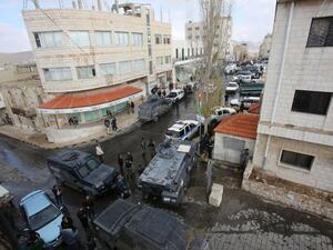 Jordanian security forces are seen patrolling on December 19, 2016 in Karak, a tourist destination, around 70 miles south of the capital Amman, following an attack a day earlier. (AFP/Khalil Mazraawi)