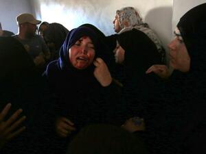 The sister of Palestinian Mahmoud Abu Taima, who was killed during a protest at the Israel-Gaza border/AFP