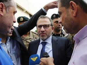 Lebanon's Foreign Minister Gibran Bassil talks to the media as he gathered ambassadors near Beirut international airport on October 1, 2018 during a tour of alleged missile sites around the Lebanese capital
