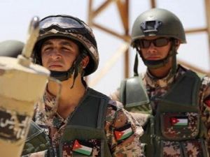 Jordanian soldiers stand guard near the Syrian border. (AFP/ File)
