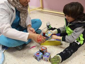 three-year-old child Ruwayd using her new prosthetic arm from 3D printing lab in Jordan. 9AFP/ File Photo)