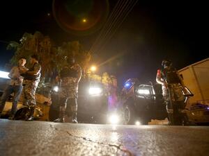 A Jordanian was killed, and another was injured along with an Israeli man on Sunday in a shooting incident at the Israeli embassy in Amman (Khalil Mazraawi/AFP)