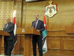 Foreign Minister Ayman Safadi, Egyptian Foreign Minister Sameh Shukri and Saeb Erekat, PLO’s executive committee’s secretary and chief Palestinian negotiator, during a press conference in Amman on Sunday (Petra photo)