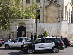 A Coptic church in Abdali is kept under watch as police and armed military vehicles surround the building. (File/Mo'taz Sulaiman) 