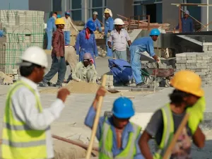 Qatar revamps its work visa rules for expats amid accusations that some sectors, especially construction, are rife with abuse of migrant workers. (AFP/Karim Jaafar)