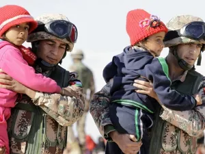 In a new poll, 65 percent of Jordanian respondents believe that the government should encourage Syrian refugees to go back to their country. (AFP/ Khalil Mazraawi)