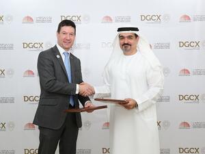 Abdulla Mohammed Al Awar, CEO of DIEDC, and Les Male, CEO of DGCX, signed the agreement at the DIEDC offices