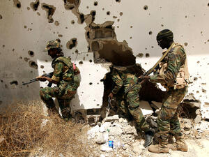 Libyan forces patrol in Benghazi in April (AFP)