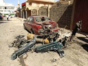A destroyed car and the remains of car bomb are seen following an explosion outside the Swedish consulate in the eastern Libyan city of Benghazi . Benghazi has witnessed a deadly series of attacks in recent times. (Image credit: AFP)