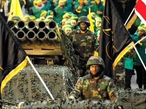 Hezbollah displays a pick-up truck mounted with a multiple rocket launcher in a parade in the southern Lebanese city of Nabatiyeh. (MAHMOUD ZAYYAT / AFP)