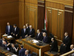 Lebanese President Michel Aoun (C) waits next to the Parliament Speaker Nabih Berri (R) at the Lebanese parliament in Beirut. (Joseph Eid / AFP)
