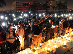 People attend an 'Earth Hour' event in Benghazi, Libya, to draw awareness to climate change. (AFP/Abdullah Doma)