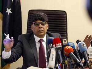 Siddik al-Sour, head of the Investigations Bureau at the Office of the Attorney General, speaks during a press conference in the Libyan capital Tripoli. (AFP/ File)