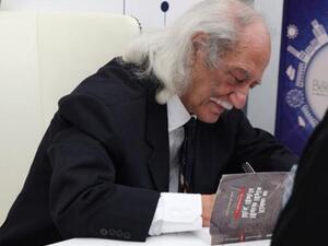 الدكتور منير طه يوقع كتابه الكشف عن الأبجدية الأولى لتاريخ الإمارات