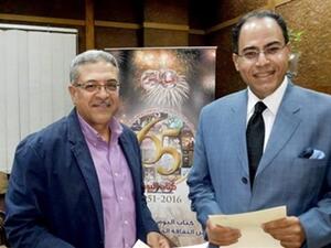 الكاتب الصحفى شريف عارف وعلاء عبد الهادى رئيس تحرير" كتاب اليوم" 