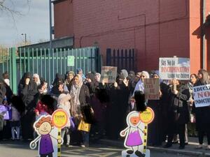 Muslim parents protesting the 'No Outsiders' program that offers classes teaching kids about LGBT+. (Twitter)