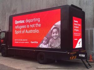Billboards seen in several parts of Australia aim to put more pressure on the Qantas Airline to stop their involvement in deporting asylum seekers in Australia. (Twitter)