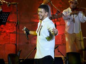 Saad Lamjarrad, one of the famous pop Arab singers whose songs exceeded millions of views on YouTube. (AFP/File Photo)
