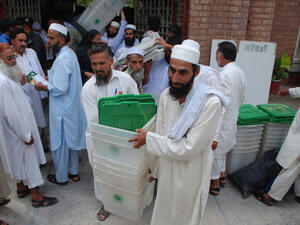 Presiding staffs carrying election material (Shutterstock/File Photo)