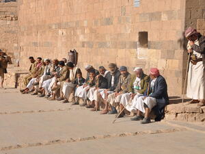 Men sit on the main square of Thula, Yemen (Shutterstock/File Photo)